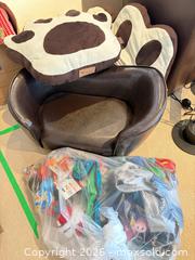 MaxSold Auction: Small Faux Leather Dog Sofa with Paw-Print Cushions - Toronto (Ontario, Canada) SELLER MANAGED Downsizing Online Auction - Joicey Boulevard