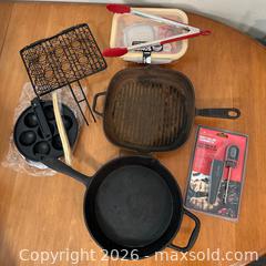MaxSold Auction: Grilling Lot - Two Cast Iron Pans, Puff Pan, Meatball Grill, BBQ Thermometer, Lunchbox & Tongs - Richmond (British Columbia, Canada) SELLER MANAGED Moving Online Auction - Gollner Avenue (CONDO)