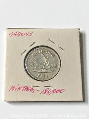 MaxSold Auction: 1935 Fiji 1 Shilling Silver Coin - Esquimalt (British Columbia, Canada) PARTNER MANAGED Reseller Online Auction -  Lampson Street
