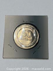 MaxSold Auction: 1947 Colombia 50 Centavos Silver Coin .500 Silver (50% Silver) - Esquimalt (British Columbia, Canada) PARTNER MANAGED Reseller Online Auction -  Lampson Street