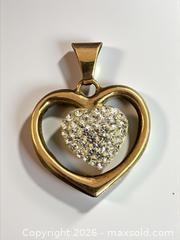 MaxSold Auction: 9ct Gold Heart Pendant  - Esquimalt (British Columbia, Canada) PARTNER MANAGED Reseller Online Auction -  Lampson Street