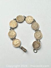 MaxSold Auction: British Silver Coin Bracelet - Esquimalt (British Columbia, Canada) PARTNER MANAGED Reseller Online Auction -  Lampson Street