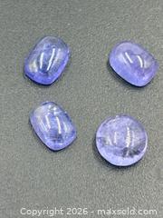 MaxSold Auction: Tanzanite Cabochon Gemstones 5.5 Carats   - Esquimalt (British Columbia, Canada) PARTNER MANAGED Reseller Online Auction -  Lampson Street