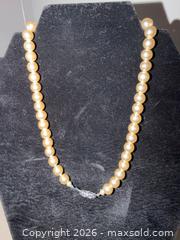 MaxSold Auction: Vintage Pearl Necklace Trio – Trifari Statement Piece and Classic Faux Pearl Strands  - Roseville (California, USA) PARTNER MANAGED Moving Online Auction - Marie Court #2