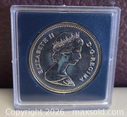 MaxSold Auction: 1982 Canada Silver Copper 1 Dollar Coin SEALED - Toronto (Ontario, Canada) PARTNER MANAGED Reseller Online Auction - Queen Street West.