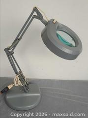 MaxSold Auction: Gray Plug-In Magnifying Lamp with Adjustable Spring-Balanced Arm - Toronto (Ontario, Canada) PARTNER MANAGED Reseller Online Auction - Queen Street West.