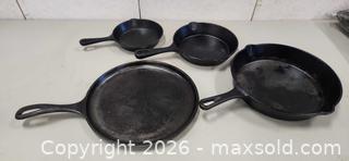 MaxSold Auction: Cast Iron Frying Pans and Flat Griddle - Pelham (Ontario, Canada) SELLER MANAGED Reseller Online Auction - Foss Road