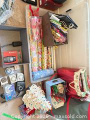 MaxSold Auction: Holiday wrapping supplies lot with wrapping paper, gift bags & tree - New Westminster (British Columbia, Canada) PARTNER MANAGED Downsizing Online Auction -  Jamieson Court (CONDO)