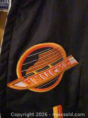 MaxSold Auction: Vintage Canucks Black "Flying Skate" Bomber Jacket by Shain of Canada - West Vancouver (British Columbia, Canada) SELLER MANAGED Estate Sale Online Auction - Marine Drive