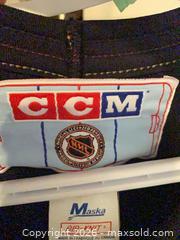 MaxSold Auction: Vintage Maska CCM Canucks Black "Flying Skate" Pavel Bure Jersey, Size S - West Vancouver (British Columbia, Canada) SELLER MANAGED Estate Sale Online Auction - Marine Drive