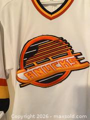 MaxSold Auction: Vintage Vancouver Canucks Trevor Linden White "Flying Skate" CCM Jersey - West Vancouver (British Columbia, Canada) SELLER MANAGED Estate Sale Online Auction - Marine Drive