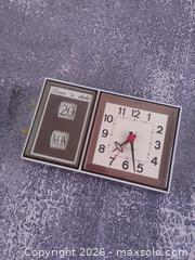 MaxSold Auction: Vintage 1970s Westclox “Time ’N Day-Date” Electric Wall Clock, Made in Canada, 10" x 6" - Toronto (Ontario, Canada) SELLER MANAGED Reseller Online Auction - Esandar Drive (STORAGE)