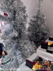 MaxSold Auction: Disney Holiday Lot: Tinsel Trees, Lighted Ceramic Tree, DISNEY Stocking Holders  - Marietta (Georgia, USA) PARTNER MANAGED Estate Sale Online Auction - Casteel Park Drive Southwest