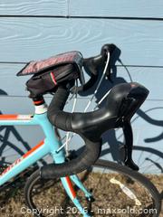 MaxSold Auction: Light Blue/Turquoise Aluminum Road Bike, 700c, Medium - Marietta (Georgia, USA) PARTNER MANAGED Estate Sale Online Auction - Casteel Park Drive Southwest