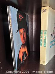 MaxSold Auction: Lot of 3 Hardcover Books with Dust Jackets: The Pythons; Bond Encyclopedia; Ripken: Cal on Cal edited by Mark Vancil.  - Marietta (Georgia, USA) PARTNER MANAGED Estate Sale Online Auction - Casteel Park Drive Southwest