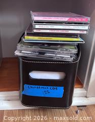 MaxSold Auction: Lot of Christmas/Holiday Audio CDs - including Michael Buble, Mariah Carey, Stevie Wonder, Frank Sinatra, Bing Crosby, Dean Martin, Ella Fitzgerald  - Marietta (Georgia, USA) PARTNER MANAGED Estate Sale Online Auction - Casteel Park Drive Southwest