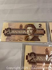 MaxSold Auction: Lot of 3 - 1986 Canadian $2 banknotes - Windsor (Ontario, Canada) SELLER MANAGED Reseller Online Auction - Byng Road