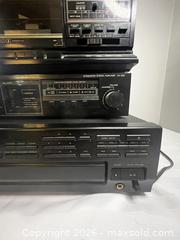 MaxSold Auction:  Vintage Fisher Studio Standard stereo system and a Kenwood 5 CD Disc Changer - Windsor (Ontario, Canada) SELLER MANAGED Reseller Online Auction - Byng Road