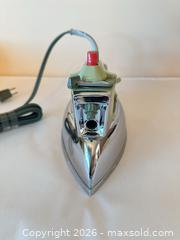 MaxSold Auction: 1960s GE Steam Iron in Light Avocado & Chrome - Sun City (Arizona, USA) PARTNER MANAGED Estate Sale Online Auction - West Jacaranda Drive