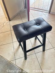 MaxSold Auction: Backless Dark Brown Faux Leather Counter Stool with Black Wood Legs - Sun City (Arizona, USA) PARTNER MANAGED Estate Sale Online Auction - West Jacaranda Drive