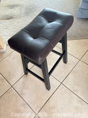MaxSold Auction: Backless Dark Brown Faux Leather Counter Stool with Black Wood Legs - Sun City (Arizona, USA) PARTNER MANAGED Estate Sale Online Auction - West Jacaranda Drive
