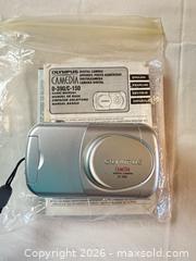 MaxSold Auction: Lot of Silver Point-and-Shoot Cameras: Fujifilm, Olympus, Vivitar - Sun City (Arizona, USA) PARTNER MANAGED Estate Sale Online Auction - West Jacaranda Drive