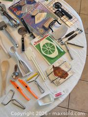 MaxSold Auction: Multi-Item Kitchen Utensil Lot with Ulu Knife & Farberware Pieces - Sun City (Arizona, USA) PARTNER MANAGED Estate Sale Online Auction - West Jacaranda Drive