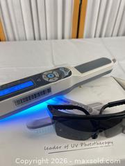 MaxSold Auction: Kernel KN-4003 Handheld UV Phototherapy Device - Campbell (California, USA) PARTNER MANAGED Downsizing Online Auction - Dell Avenue