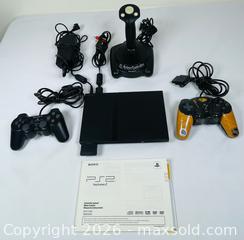 MaxSold Auction: Sony PlayStation 2 Console with ThrustMaster XL Joystick & Controllers - Clarence-Rockland (Ontario, Canada) PARTNER MANAGED Estate Sale Online Auction - Campeau Crescent