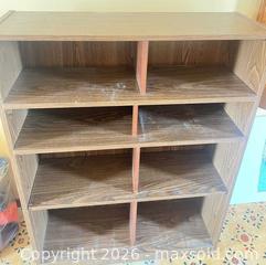 MaxSold Auction: Brown Laminated Particleboard Bookshelf, 4 Shelves, 8 Compartments - Point Edward (Ontario, Canada) SELLER MANAGED Estate Sale Online Auction -  Michigan Avenue