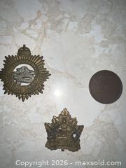 MaxSold Auction: Early 20th C Canadian Cap & Lapel Badges with Medal/Token - Point Edward (Ontario, Canada) SELLER MANAGED Estate Sale Online Auction -  Michigan Avenue