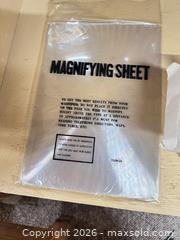 MaxSold Auction: Mixed magnifier set with sheet, loupes and carrying case - Point Edward (Ontario, Canada) SELLER MANAGED Estate Sale Online Auction -  Michigan Avenue