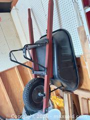 MaxSold Auction: Wheelbarrow with Painted Steel Tray, Wooden Handles, Pneumatic Wheel - Point Edward (Ontario, Canada) SELLER MANAGED Estate Sale Online Auction -  Michigan Avenue