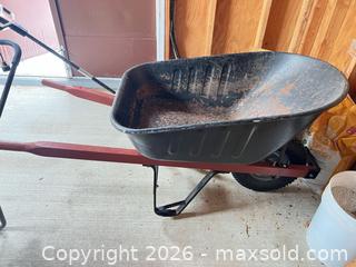 MaxSold Auction: Wheelbarrow with Painted Steel Tray, Wooden Handles, Pneumatic Wheel - Point Edward (Ontario, Canada) SELLER MANAGED Estate Sale Online Auction -  Michigan Avenue
