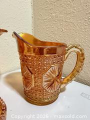 MaxSold Auction: Marigold Carnival Glass Starburst Set, 3 Pieces - Cupertino (California, USA) SELLER MANAGED Downsizing Online Auction - Rollingdell Drive (CONDO)