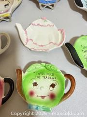 MaxSold Auction: Porcelain Novelty Face Tea Bag Holders, Multi-Color, Made in Japan (8) - Cupertino (California, USA) SELLER MANAGED Downsizing Online Auction - Rollingdell Drive (CONDO)