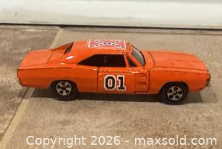 MaxSold Auction: 1981 ERTL Dukes of Hazzard General Lee (01) Orange (Qty2) - Wake Forest (North Carolina, USA) PARTNER MANAGED Downsizing Online Auction -  Marbank Street