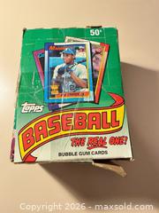 MaxSold Auction: 1990 Topps Ken Griffey Jr. Wax Display Box with seal card packs inside  - Wake Forest (North Carolina, USA) SELLER MANAGED Downsizing Online Auction -  Marbank Street