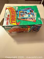 MaxSold Auction: 1990 Topps Ken Griffey Jr. Wax Display Box with seal card packs inside  - Wake Forest (North Carolina, USA) SELLER MANAGED Downsizing Online Auction -  Marbank Street