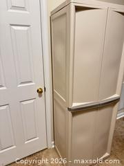 MaxSold Auction: Beige Plastic 2-Door Storage Cabinet, Assembled - Wake Forest (North Carolina, USA) PARTNER MANAGED Downsizing Online Auction -  Marbank Street