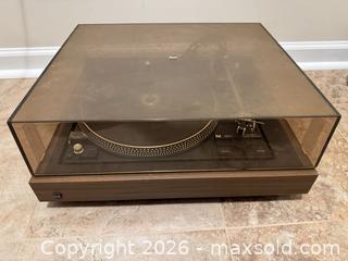 MaxSold Auction: Dual CS 1257 Turntable / Record Player, Walnut Plinth - Wake Forest (North Carolina, USA) PARTNER MANAGED Downsizing Online Auction -  Marbank Street
