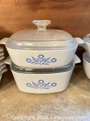 MaxSold Auction: Vintage CorningWare Cornflower Bakeware Set with Lids - Wake Forest (North Carolina, USA) SELLER MANAGED Downsizing Online Auction -  Marbank Street