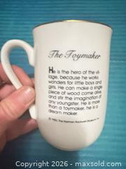 MaxSold Auction: Norman Rockwell 'The Toymaker' Porcelain Mug with Gold Trim - Clarington (Ontario, Canada) SELLER MANAGED Downsizing Online Auction - Trulls Road