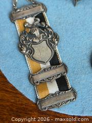 MaxSold Auction: 800 Silver German Shatlen + Military Badges - Hamilton (Ontario, Canada) SELLER MANAGED Estate Sale Online Auction - Gertrude Street