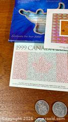 MaxSold Auction: Y2K Stamp And Coin Set + Canada Half Dollars  - Hamilton (Ontario, Canada) SELLER MANAGED Estate Sale Online Auction - Gertrude Street