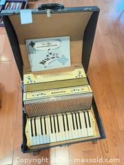 MaxSold Auction: Hohner Accordion with Piano-Style Keyboard, Yellow/Cream & Black hard case - Victoria (British Columbia, Canada) PARTNER MANAGED Estate Sale Online Auction - Haida Drive