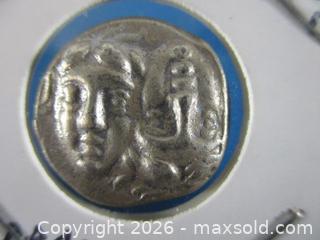 MaxSold Auction: Ancient Greek Silver Drachm Currency Coin. Inverted Heads Of Apollo. 400-350 B.C. - Toronto (Ontario, Canada) SELLER MANAGED Estate Sale Online Auction - Annette Street