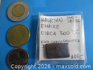 MaxSold Auction: Ancient Mauryan Empire 340-181 B.C. (India), King Chandragupta 321 B.C. Square Copper Currency Coin. - Toronto (Ontario, Canada) SELLER MANAGED Estate Sale Online Auction - Annette Street