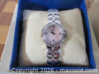 MaxSold Auction: ESQ Ladies E5437 Silver Stainless Steel Diamond Bezel Watch. In Mint State. - Toronto (Ontario, Canada) SELLER MANAGED Estate Sale Online Auction - Annette Street