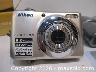 MaxSold Auction: Five Digital Cameras. 2 CANON, One Sony, NIKON & One FUJI Film. Plus 2 Motorola Walkie Talkies. Battery Chargers. - Toronto (Ontario, Canada) SELLER MANAGED Estate Sale Online Auction - Annette Street